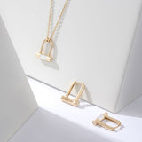 Noi Arch White Huggie Earrings ELKS4184